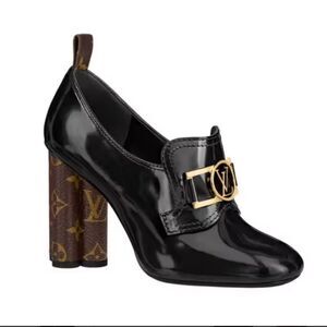 Louis Vuitton Glossy Black Heels with Gold Accent